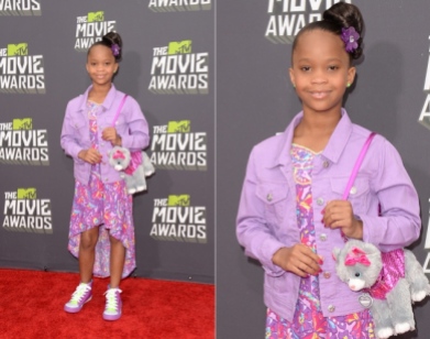 Cutie Quvenzhane Wallis looked adorable in a floral dress and her staple dog purse
